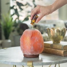 Combine the warm scent of your favorite fragrance oil with the benefits of a Himalayan salt lamp. Emitting energizing negative ions for air purification, this lamp seamlessly blends the natural benefits of Himalayan salt with captivating scents from our premium fragrance oils. Create a tranquil haven in your space, enjoying the dual benefits of a natural-feeling light source and therapeutic aromatherapy. Click here for our selection of breakaway melts﻿, here for our 2 oz home fragrance oils, and Himalayan Lamp, Candle Christmas Tree Lights, Himalayan Salt Benefits, Candle Alternatives, Fiber Optic Christmas Tree, Salt Lamps, Oil Warmer, Himalayan Salt Lamp, Salt Lamp