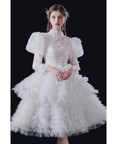 Buy vogue puffy ruffled tulle knee length wedding dress with bubble sleeves at wholesale price online. Free shipping and pro custom service since 2009. Poofy Sleeves Tulle Dress Short, Luxury Dresses With Voluminous Skirt And Puff Sleeves, Luxury Long Sleeve Puff Dress With Ruffles, Luxury Elegant Dress With Puff Balloon Sleeves, Luxury Ruffled Bubble Dress For Summer, Fluffy Wedding Dress Sleeves, Luxury Puff Sleeve Wedding Dress With Ruffles, Luxury Puff Sleeve Dress With Ruffles For Wedding, Luxury Billowy Puff Sleeve Dress With Balloon Sleeves