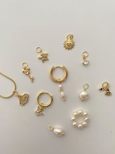 Build your own earrings with these dainty charms！It's removable and interchangeable with any of the earrings/necklaces. * The price is for ONE piece charm.  Discover our Build Your Own Jewelry Collection⇩ https://vannipearl.etsy.com [DETAILS] 14k Gold Plated over Brass Freshwater Pearl 5mm Charm Jump Ring  [Charm Size] Baroque Pearl: 8mm Double Pearl: 6mm Single Pearl: 6.8-7.5mm Pearl Loop: 1.6mm (diameter) Sun: 10.5mmx12mm Star: 12mmx10mm CZ Stone: 4mm Butterfly: 8mm Cloud: 10mmx11.5mm Rainbow: Luxury Pearl Charm Earrings, Single Pearl, Necklace Charms, Gold Charms, Purple Pearl, Pearl Charms, Cross Charms, Star Earrings, Gold Charm