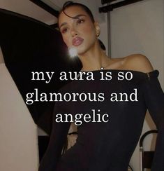 a woman with her hand on her hip and the caption says, my aura is so glamourous and angelic