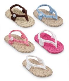 four crocheted sandals with white, pink, and blue trims on them