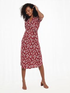 A clean, modern take of the classic puff sleeve dress.   Where a Japanese minimalist floral print meets a classic French silhouette for the ultimate elegant look.  Our HANA Wrap Dress is a versatile creative fashion piece that can be tied in 3 different ways.   Best paired with a rich glass of red or white wine. Choose your size with care. Model is 5'10, wearing size M. Elegant V-neck Midi Dress With Ditsy Floral Print, Elegant Red Wrap Dress For Spring, Elegant Red Floral Midi Dress, Elegant Floral Print Wrap Dress For Date Night, Feminine Red Floral Print Midi Dress, Red Midi Dress With Ditsy Floral Print, Summer Floral Midi Dress For Work, Elegant Fitted Midi Dress With Ditsy Floral Print, Elegant Knee-length Ditsy Floral Dress