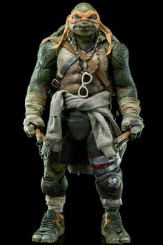 the teenage mutant action figure is shown in full costume, with his hands on his hips