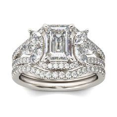 an emerald cut diamond engagement ring set