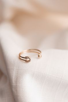 Mini gold ring with lucky horse shoe detail. Adjustable. Elegant Horseshoe Rings For Gifts, Gold Open Initial Ring With Detail, Gold Open Initial Ring, Elegant Gold Horseshoe Rings, Elegant Yellow Gold Horseshoe Rings, Adjustable Gold Horseshoe Jewelry, 14k Gold Horseshoe Ring, Gold Horseshoe Jewelry For Anniversary, Lucky Ring