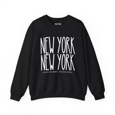 Elevate your urban style with our "New York New York Chic" Women's Sweatshirt, designed for those who appreciate the dynamic energy of the city that never sleeps. Embrace the essence of New York's iconic fashion scene while enjoying unparalleled cozy comfort. Crafted from premium materials, this sweatshirt is more than just a garment; it's a statement piece. The intricate design seamlessly integrates the bold "New York New York" lettering, showcasing your love for the city's vibrant spirit. The Winter Slogan Tops For Streetwear, Urban Graphic Print Tops For Winter, Urban Winter Tops With Logo Print, Winter Streetwear Top With Text Print, Urban Style Text Print Tops For Fall, Urban Tops With Text Print For Fall, Urban Text Print Tops For Fall, Urban Winter Tops With Text Print, Urban Style Letter Print Sweatshirt For Fall