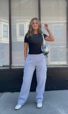 A flattering sweatpant is always a MUST! These sweats have cargo pockets on the sides & back - comes in heather grey, black & taupe. Model in grey and taupe is 5'5 with a 28" bust, 25" waist, 35" hips, and wearing a small. Model typically wear a 2/4. Model in black is 5'5" with a 32" bust, 24" waist, 25" hips, and wearing a small. Model usually wears size 00/0. This item runs true to size. Tna Sweatpants Outfit, Tna Cargo Sweatpants Outfit, Sweats Pants Outfit, Grey Cargo Sweatpants Outfit, Black Cargo Sweatpants Outfit, Grey Sweatpants Outfit Aesthetic, Sweat Pants Outfit For School, Black Sweatpants Outfit For School, School Gym Outfits