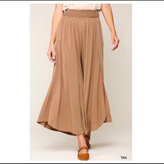 ~ 100% Rayon ~ Tan ~ Side Slits ~ Palazzo Pants Bin: K Solid Rayon Bottoms For Spring, Elegant Flowy Bottoms For Day Out, Chic High Waist Rayon Bottoms, Trendy Stretch Bottoms With Side Slits, Trendy Spring Wide Leg Rayon Pants, Casual Solid Bottoms With Side Slits, Spring Wide Leg Pants With Side Slits, Spring High Waist Rayon Wide Leg Pants, Chic Full-length Culottes With Elastic Waistband