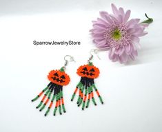 "Stylish earrings for Halloween, Seed bead pumpkin earrings These pumpkin earrings for Halloween are specially made for you to emphasize your style for the holiday. They emphasize your style and help you stand out from everyone else. This earrings is made from the high-quality Czech bead, with the use of sterling silver furnice, with a bright pumkin pattern. This pumpkin earrings can carry every girls and woman of any age, harmonizes with any clothes. Earrings details: Length: Dangle earrings me Beaded Dangle Earrings For Halloween, Dangle Beaded Earrings For Halloween, Halloween Beaded Dangle Earrings Gift, Halloween Gift Beaded Dangle Earrings, Adjustable Beaded Earrings For Halloween, Beaded Pumpkin Earrings, Halloween Seed Bead, Bead Pumpkin, Beaded Pumpkin