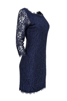 Look lovely in this stunning navy number from Diane von Furstenberg. The "Zarita" dress boasts a gorgeous floral lace overlay, a sultry v-back, and playful sheer lace sleeves. Perfect for sipping cocktails with pals or a romantic evening out! Glam it up with shiny heels, dazzling statement earrings, and a matching metallic clutch for a head-turning ensemble. Size 8 Shell 70% Rayon, 30% Nylon Lining 88% Viscose, 12% Silk Exposed back zipper Bodycon silhouette V-back Scoop neckline Sheer three-qua Elegant Spring Lace Dress With Back Zipper, Spring Formal Lace Dress With Lace Back, Formal Lace Dress With Lace Back, Formal Dress With Lace Back, Lace Dress With Back Zipper For Date Night, Formal Sheath Dress With Lace Patchwork, Blue Formal Lace Dress With Lace Bodice, Formal Sheath Dress With Lace Sleeves, Blue Lace Dress With Lace Trim For Formal Occasions