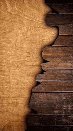 a wooden background with several pieces of wood cut in half to look like an animal's head