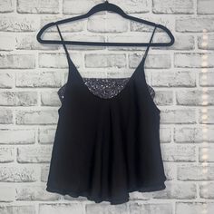 Free People Black Spaghetti Strap Top With Sequins Bralette Attached. Perfect For Going Out Or Just A Cute Top For Warmer Weather. Black Stretch Camisole With Spaghetti Straps, Black Stretch Camisole For Summer, Casual Camisole With Straps For Party, Summer Evening Tank Top With Straps, Black Camisole Tank Top For Night Out, Black Stretch Camisole For Night Out, Stretch Camisole With Spaghetti Straps For Night Out, Stretch Spaghetti Strap Camisole For Night Out, Stretch Black Camisole For Night Out