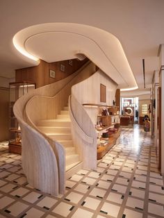 a spiral staircase in the middle of a room