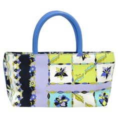 Snag this unique print Pucci bag for the upcoming poolside season. Emilio Pucci is known for his fluid shapes, kaleidoscopic motifs, and bright colors. This bag features a beautiful blue leather handle, intricate flower print with hues of lime green, purple, blue and black, and a spacious monogrammed interior. Think about pairing this with your favorite summer dress in your closet and some vintage Dior wedges. Length: 6in Width: 13in Depth: 3in Designer Blue Square Bags, Luxury Floral Print Top Handle Bag, Designer Bags With Floral Print For Shopping, Multicolor Floral Print Top Handle Shoulder Bag, Designer Bags With Floral Print For Spring, Multicolor Floral Print Top Handle Bag, Designer Rectangular Bag For Spring, Designer Rectangular Bags For Spring, Designer Floral Print Bags For Spring