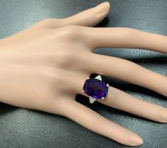 9.35 Carats Natural Impressive Amethyst and Diamond 14K Yellow Gold Ring Suggested Replacement Value $4,500.00 Total Amethyst Weight: Approx. 9.00 Carats Amethyst Measures: Approx. 16 x 12mm Natural Round Diamonds Weight: 0.35 Carats (color G-H / Clarity SI1-SI2) Ring total weight: 7.2 grams Disclaimer: all weights, measurements and colors are approximate and may vary slightly from the listed dimensions or as seen in the image. All pictures are magnified to show the smallest of details. Please, Luxury Cushion Cut Amethyst Ring For Formal Occasions, Luxury Amethyst Cushion Cut Ring For Formal Occasions, Luxury Amethyst Cushion Cut Ring For Formal Events, Luxury Purple Cushion Cut Jewelry, Luxury Cushion Cut Amethyst Ring For Anniversary, Formal Cushion Cut Amethyst Jewelry, Formal Amethyst Cushion Cut Jewelry, Cushion Cut Amethyst Ring For Formal Occasions, Formal Amethyst Cushion Cut Ring With Accent Stones