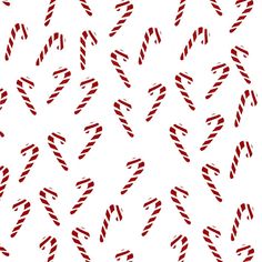 red and white candy canes are arranged on a white background with diagonal lines in the center