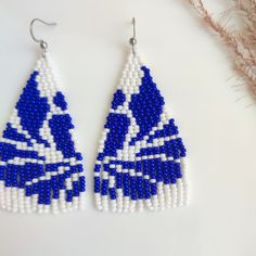 White and Blue Pattern Boho Beaded Fringe Earrings, Ombre Long Chandelier Dangle Earrings, Hippie Bohemian Dangling Statement Jewelry - Etsy Bohemian Blue Long Drop Beaded Earrings, Blue Bohemian Beaded Earrings For Pierced Ears, Blue Beaded Dangling Earrings For Festivals, Blue Beaded Earrings With Dangling Beads For Festival, Blue Dangling Beads Earrings For Festival, Traditional Blue Beaded Earrings, Blue Bohemian Beaded Dangle Earrings, Traditional Blue Chandelier Earrings For Festivals, Blue Traditional Chandelier Earrings For Festivals