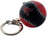 a red and black baseball keychain with a metal ball on it's side