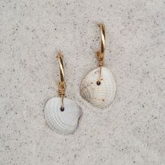 Easy, breezy, and a little bit beachy - the perfect earring when you want better than basics. ABOUT THE NAME Cortez Beach is one of the last remaining fishing villages on Florida's southwest Gulf coast. Just pull off the side of the road and take a quick walk through the tall trees and coastal grasses to the white sand beach. MATERIALS Cross-barred Venus shells on with 14k gold-filled hoops Every stone, shell, and handmade glass piece is unique, which means that each charm is too. You can expect Nickel-free Bohemian Earrings For Vacation, Bohemian Nickel-free Earrings For Vacation, Bohemian Nickel Free Earrings For Vacation, Bohemian Earrings With Ear Wire For Vacation, Single Drop Earring For Vacation, Nickel-free Bohemian Earrings For Beach, Bohemian Nickel-free Earrings For Beach, Bohemian Nickel-free Hoop Earrings For Beach, Bohemian Ear Wire Jewelry For Beach