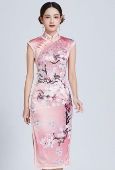 Elegant Floral Print Cheongsam With Stand Collar, Elegant Sleeveless Fitted Ao Dai, Elegant Floral Print Cheongsam For Spring, Elegant Floral Print Spring Cheongsam, Elegant Spring Floral Print Cheongsam, Elegant Fitted Cheongsam With Floral Print, Elegant Spring Floral Cheongsam, Formal Fitted Pink Cheongsam, Fitted Pink Dress With Stand Collar