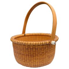 a wicker basket is shown with a handle on the front and side of it