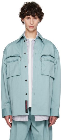 Cotton-blend twill shirt. · Spread collar · Button closure · Zip and bellows pockets · Vented side seams · Single-button barrel cuffs · Twin pleats at back yoke Supplier color: Steel blue Twill Shirt, Bellows, Steel Blue, Bottega Veneta, Cotton Shirt, Apparel Accessories, Barrel, Top Shirt, Cotton Blend