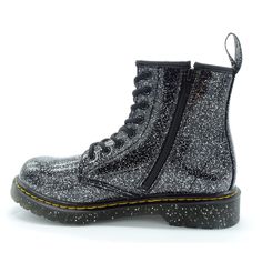 PRICES MAY VARY. Scaled down, but big in spirit, these Dr. Marten's Kid's Collection 1460 Lace Up Fashion Boot were designed with the next generation of rebels in mind. Retains classic Docs DNA including grooved edges, yellow stitching and a scripted heel loop. Built on the iconic and comfortable Dr. Martens air-cushioned sole and featuring flexible, lightweight cemented construction for growing feet. Goodyear welt construction heat seals and sews the upper and sole together for superior flexibi Kids Luggage, Goodyear Welt, Luxury Store, The Next Generation, Big Kid, Next Generation, Pharmacy Gifts, Dr. Martens, Big Kids