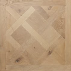 an image of wood flooring that looks like herringbones