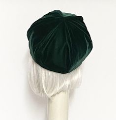 Emerald green rayon velvet, lined in rayon print ,the top of the hat has 6 section crown, 1" soft elastic band inside. One size fits most up to 22" Dry clean only Made in USA Emerald Velvet, Beret Hat, Dry Clean Only, Sun Hats, Elastic Band, Emerald Green, Made In Usa, Emerald, Dry Clean