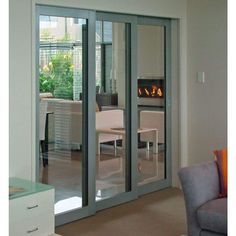 an open living room with sliding glass doors