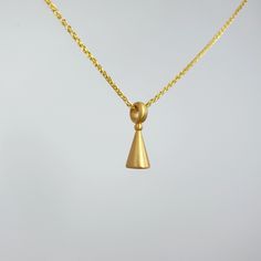 ◊◊ A unique solid 14Κ gold Cone, 14K Cone charm pendant, both beautiful and minimal.  The divine shape of the Cone! A beautiful and special gift to yourself and your loved ones!  Perfect for layering and everyday wear!  Be different with a dainty piece of art, that will stay in your family for generations to come!   We create exquisite designs, with an emphasis on the three-dimensional rendering of the forms.  Because nothing around us is flat, how could our designs be?!  ◊◊ Dimensions of the Co Dainty Gold Drop Charm Necklace, Yellow Gold Charm Necklace In Recycled Gold, Teardrop 14k Yellow Gold Charm Necklaces, Dainty Yellow Gold Charm Necklace In Recycled Gold, Dainty Yellow Gold Charm Necklace Of Recycled Material, 14k Yellow Gold Teardrop Charm Necklaces, Dainty Yellow Gold Charm Necklace With Recycled Material, Delicate Yellow Gold Brass Charm Necklaces, Minimalist Gold-plated Yellow Gold Charm Necklace