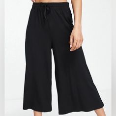 Asos Design Petite Cropped Drawstring Pants In Black Size 2. Pants Are Super Comfy And Lightweight. Pants Are Brand New And Have Never Been Worn Before! Black Wide Leg Pants With Drawstring, Black Wide Leg Pants With Elastic Waistband For Loungewear, Black Drawstring Wide Leg Pants For Summer, Black Wide-leg Drawstring Bottoms, Black Drawstring Wide Leg Pants For Spring, Black Wide Leg Drawstring Pants, Black Wide Leg Pants With Drawstring For Spring, Black Wide Leg Pants With Drawstring Relaxed Fit, Black Wide Leg Pants With Drawstring And Relaxed Fit