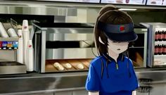 a woman standing in front of a counter at a fast food restaurant wearing a blue shirt and hat