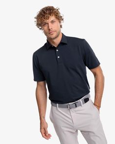 The front view of the Southern Tide brrr-eeze Heather Performance Polo Shirt by Southern Tide - Heather Caviar Black Collar Stays, Sophisticated Dress, Cute Swimsuits, Comfy Sweaters, Khaki Shorts, Quarter Zip Pullover, The Boat, Short Jacket, Stay Cool