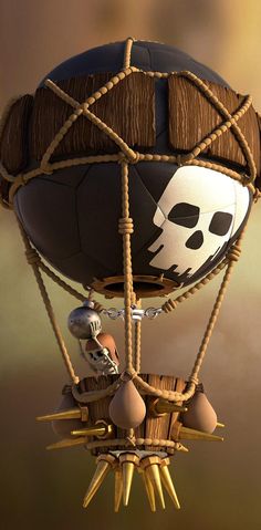 a hot air balloon with a skull painted on it's side and strings attached to the bottom