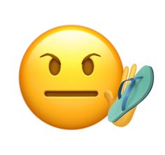 an emoticive smiley face with a pair of flip flops