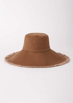 Pretend you’re on a permanent holiday with our Lanai Hat. Made from 100% soft cotton with a beautiful frayed edge for added detail. Perfect for beach days, tropical getaways and more. Product Specs 100% cotton Fully lined Bucket hat style 5.5" brim Frayed edge Inner elastic band Available in cream or brown Size & Fit S/M suitable for 57cmL/XL suitable for 59cm Our Lanai hat fits true to size. We recommend using a soft measuring tape and measuring your head based on how you would like to wear Beach Poncho, The Beach People, Bucket Hat Style, Beach Cart, Beach People, Holiday Hats, Tropical Holiday, Hat Fits, Kids Vacation