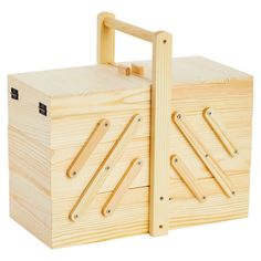 a wooden box with handles and latches on the sides, set against a white background