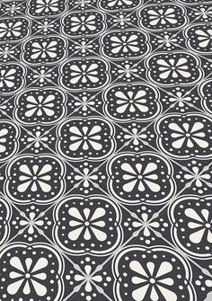 a black and white pattern with circles on it