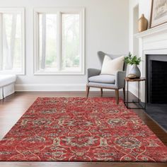 a living room with white walls and wooden floors