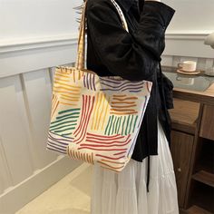 SPECIFICATIONSBrand Name: YogodlnsOrigin: Mainland ChinaCN: GuangdongLining Material: NonePlace Of Origin: GUANG DONG ProvincePlace Of Origin: GUANG DONG ProvinceShape: Casual ToteMain Material: CanvasStyle: CasualClosure Type: haspOccasion: VersatilePattern Type: StripedInterior: No PocketGender: WOMENDecoration: NONEExterior: NONEHardness: SOFTChoice: yes Casual Multicolor Canvas Bag With Large Capacity, Casual Multicolor Large Capacity Canvas Bag, Multicolor Handheld Shoulder Bag For School, Casual Multicolor Canvas Shopping Bag, Multicolor Canvas Bag For Daily Summer Use, Summer Multicolor Canvas Bag For Daily Use, Multicolor Summer Canvas Bag For Daily Use, Casual Multicolor Square Canvas Bag, Casual Multicolor School Bag