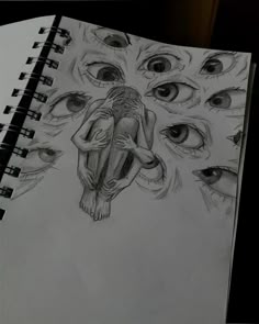 a pencil drawing of an eyeballed human being surrounded by eyes