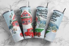 three christmas themed tumblers are on display