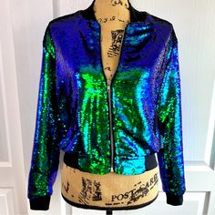 Lularoe Elegant Sequin Bomber Jacket Stevie Nwt. Such A Beautiful Jacket. In Pristine Condition. No Defects That I Can Find. Mermaid Color. Open To Reasonable Offers. Green Fall Outerwear For Night Out, Green Outerwear For Night Out In Fall, Green Long Sleeve Outerwear For Night Out, Blue Stretch Outerwear With Zipper Closure, Trendy Blue Outerwear For Parties, Trendy Blue Party Outerwear, Blue Outerwear For Fall Party, Blue Party Outerwear For Fall, Blue Spring Outerwear For Night Out