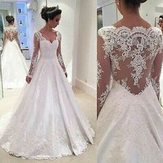 the back of a wedding dress with long sleeves