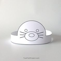 a paper hat with a cat's face on it