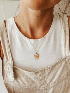 The Heirloom Necklace is a timeless beauty that makes a minimal yet elegant statement.14 Karat Gold Filled, Non-Tarnish, Hypoallergenic 16, 18, and 20 inch chain options.Oval measures 22 x 15 mm.Can be left as is or a single letter can be added to the center. Dainty Coin Pendant Necklace For Everyday, Dainty Everyday Necklace With Coin Pendant, Everyday Delicate Oval Chain Jewelry, Everyday Medallion Jewelry With Adjustable Chain, Delicate Everyday Charm Necklace With Coin Pendant, Dainty Locket Necklace For Everyday, Everyday Round Medallion Necklace, Engraved Oval Pendant Jewelry For Everyday, Delicate Everyday Coin Pendant Jewelry