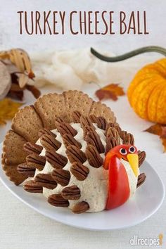 a white plate topped with cookies and a turkey