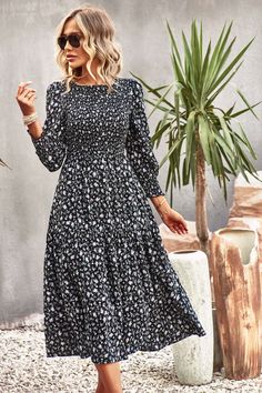 Femme meets fancy in the Trading Places Floral Midi Dress in black that features a flowy skirt. Size Guide: Tina is 5’65” tall, and has a 33.6” bust, 24.1” waist, & 35.2” hips. She is wearing a S / US 4 / AU 8. This dress is true to size. Material: 100% Viscose. Feature: High neckline. Midi length. Smocked bodice. Quarter sleeves Care Instructions: Machine wash / Cold hand wash Black Knee-length Floral Dress For Garden Party, Black A-line Dress With Floral Print, Casual Black A-line Floral Dress, Black A-line Maxi Dress For Brunch, Flowy Floral Print Knee-length Midi Dress, Floral Midi Dress For Date Night, Flowy Floral Midi Dress, Flowy Black Floral Print Dress, Floral Midi Maxi Dress For Date Night