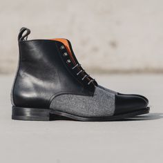 A modern twist on a classic military style. Stay sharp with this unique twist on our jumper boot. Features: Light Grey Flannel vamp and back Box Calf Black Zurigo traditional rounded toe Orange Leather Lining Old Silver Metal Grey Laces Black Outsole Leather Orange Sole Handcrafted with Passion Goodyear Welt Construction Can be Resoled Goodyear Welted Cap Toe Chelsea Boots For Fall, Fitted Leather Sole Cap Toe Boots, Leather Sole Cap Toe Boots, Fitted Cap Toe Boots, Winter Goodyear Welted Cap Toe Chelsea Boots, Winter Brogue Snip Toe Boots, Winter Brogue Boots With Snip Toe, Winter Boots With Brogue Detailing And Snip Toe, Fitted Cap Toe Lace-up Boots With Rubber Sole